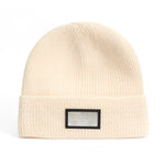 Load image into Gallery viewer, Fevani Wool Winter Beanie With Metal Badge FEVANI
