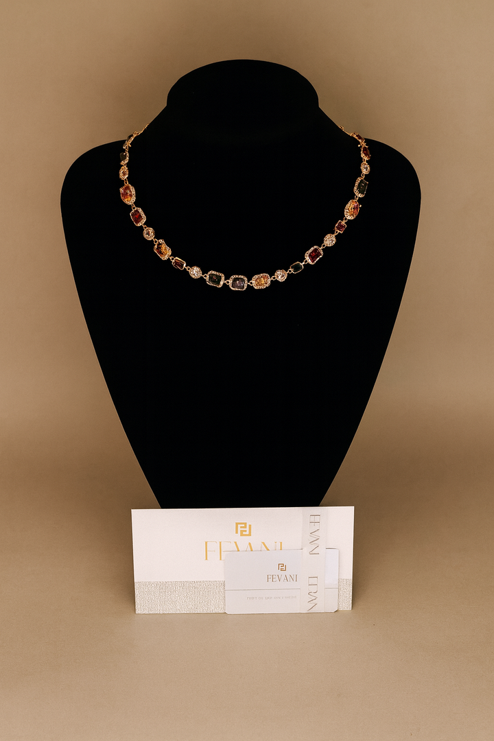 Necklace on a black mannequin bust with a beige background