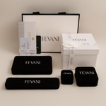 Load image into Gallery viewer, Fevani jewelry packaging including a box, card, and jewelry cases on a light background
